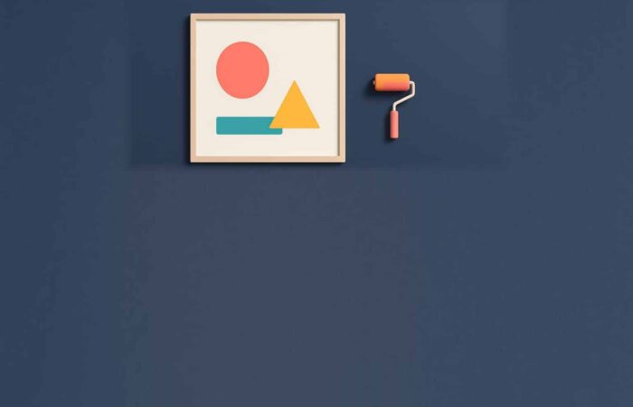 Affiche blanche encadree sur mur navy avec formes colorees, illustration plate